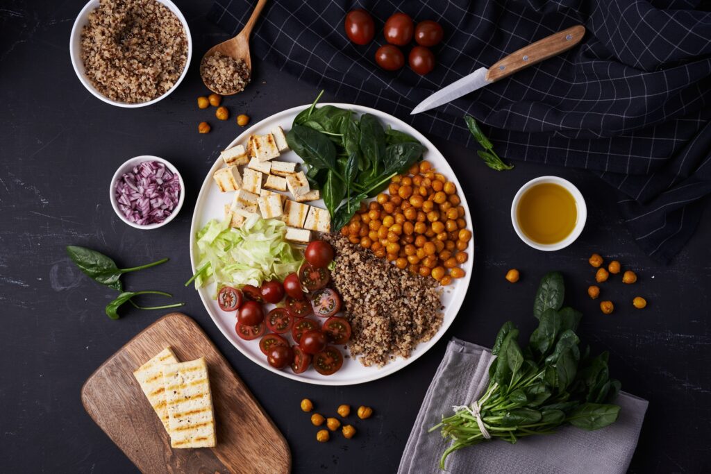 salads bowl with healthy carbs like quinoa and chickpeas